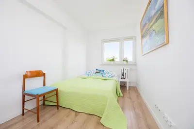 Łóżko lub łóżka w pokoju w obiekcie Cosy Apartment with Smart TV by Noclegi Renters