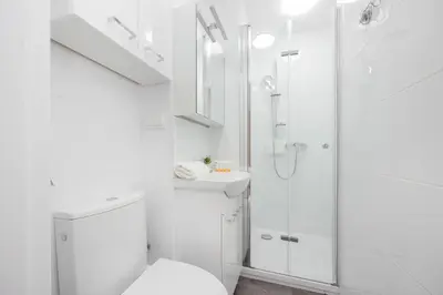 Łazienka w obiekcie Cosy Apartment with Smart TV by Noclegi Renters