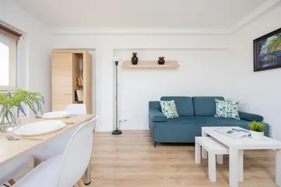Część wypoczynkowa w obiekcie Cosy Apartment with Smart TV by Noclegi Renters