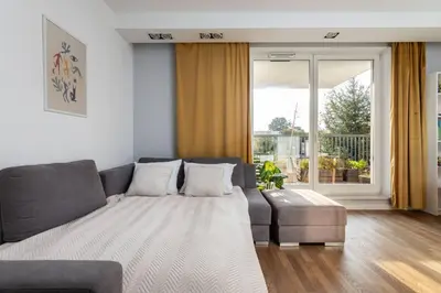 Łóżko lub łóżka w pokoju w obiekcie Apricot 3 Room Apartment Bobrowiecka Mokotow