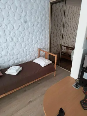 Łóżko lub łóżka w pokoju w obiekcie Złota Center Apartament