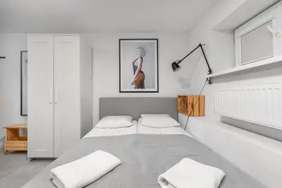 Łóżko lub łóżka w pokoju w obiekcie Batorego 16 by Homeprime