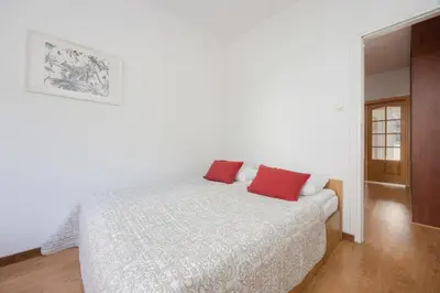 Łóżko lub łóżka w pokoju w obiekcie Spacious Apartment with Parking by Noclegi Renters