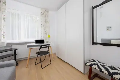 Telewizja i/lub zestaw kina domowego w obiekcie Family Apartment with Balcony by Noclegi Renters