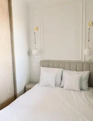 Łóżko lub łóżka w pokoju w obiekcie Elegancki apartament z jedną sypialnią
