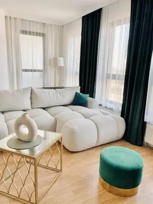 Część wypoczynkowa w obiekcie Elegancki apartament z jedną sypialnią