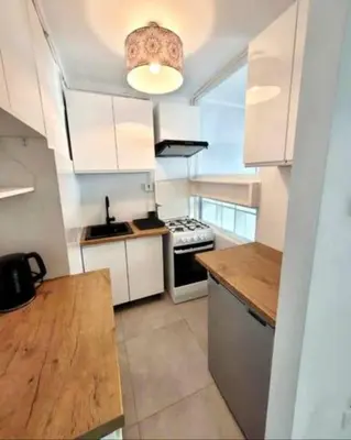 Kuchnia lub aneks kuchenny w obiekcie City Centre top floor Apartment