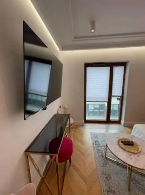 Telewizja i/lub zestaw kina domowego w obiekcie Pawia Charming Studio