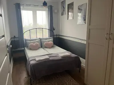 Łóżko lub łóżka w pokoju w obiekcie Apartament Stańczyka 4