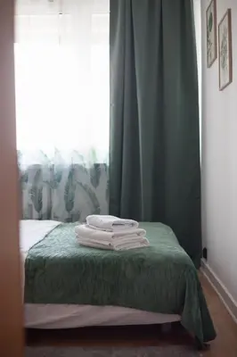 Łóżko lub łóżka w pokoju w obiekcie Wola Lavish Apartment by BookingHost