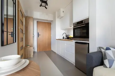 Kuchnia lub aneks kuchenny w obiekcie Blue Apartment Warszawa Praga
