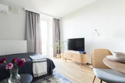 Telewizja i/lub zestaw kina domowego w obiekcie Blue Apartment Warszawa Praga