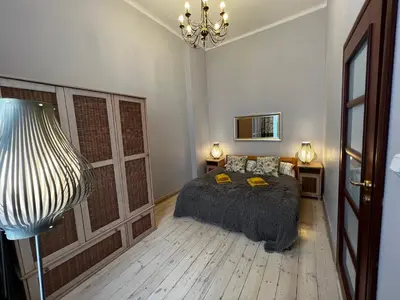 Łóżko lub łóżka w pokoju w obiekcie Apartament 105 Centrum
