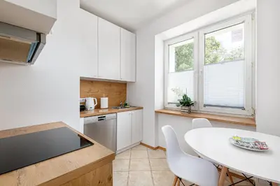 Kuchnia lub aneks kuchenny w obiekcie RentPlanet - Apartament Służew