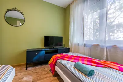 Telewizja i/lub zestaw kina domowego w obiekcie Apart Rooms City Centr
