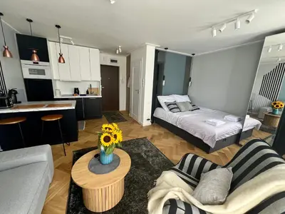 Łóżko lub łóżka w pokoju w obiekcie Apartament Blue