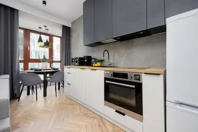 Kuchnia lub aneks kuchenny w obiekcie Tasteful Apartment with Parking by Noclegi Renters