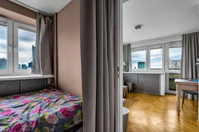 Łóżko lub łóżka w pokoju w obiekcie Chmielna 35 by Homeprime