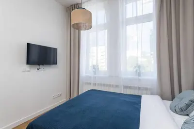 Łóżko lub łóżka w pokoju w obiekcie Stylish Studio Apartments In City Center Sienna