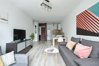 Telewizja i/lub zestaw kina domowego w obiekcie Urbannestgroup - City Center - al Jana Pawla II