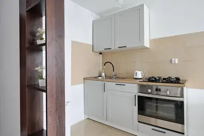 Kuchnia lub aneks kuchenny w obiekcie Urbannestgroup - City Center - al Jana Pawla II