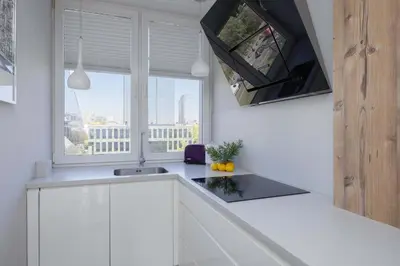 Kuchnia lub aneks kuchenny w obiekcie Stylish Apartment in Downtown Warsaw by Noclegi Renters