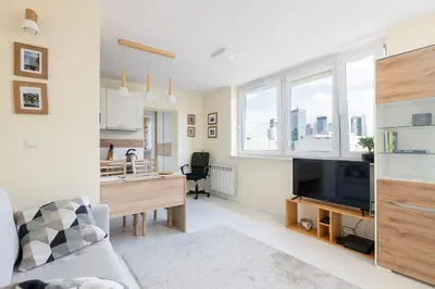 Kuchnia lub aneks kuchenny w obiekcie RentPlanet - Apartament Wola