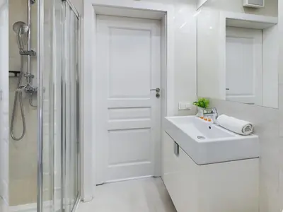 Łazienka w obiekcie Klimatyczne Studio z Balkonem Warszawa by Noclegi Renters