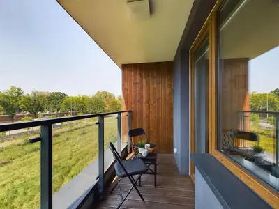 Balkon lub taras w obiekcie Klimatyczne Studio z Balkonem Warszawa by Noclegi Renters
