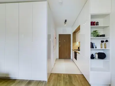 Kuchnia lub aneks kuchenny w obiekcie Klimatyczne Studio z Balkonem Warszawa by Noclegi Renters