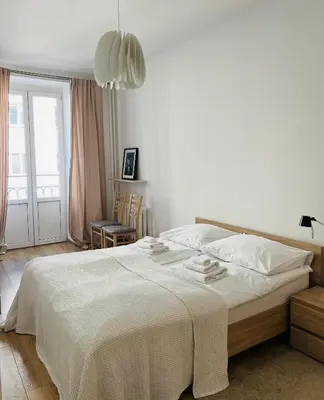 Łóżko lub łóżka w pokoju w obiekcie Warsaw Apartament
