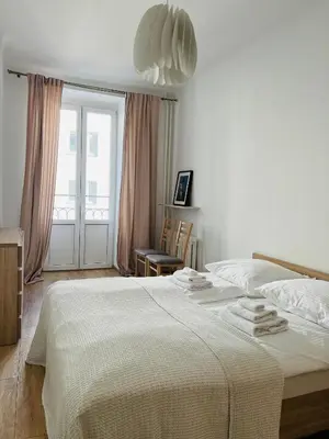 Łóżko lub łóżka w pokoju w obiekcie Warsaw Apartament