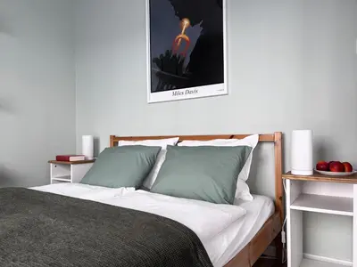 Łóżko lub łóżka w pokoju w obiekcie Metro Dzialdowska - Spacious studio