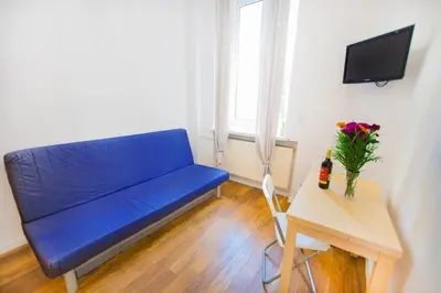 Telewizja i/lub zestaw kina domowego w obiekcie Lovely Hoza str Studio Super central location