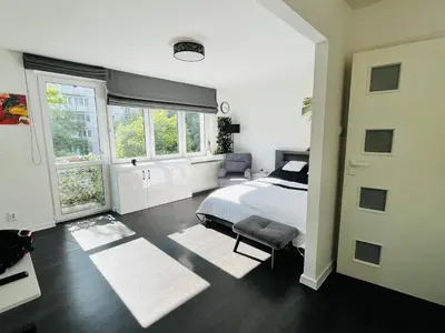Łóżko lub łóżka w pokoju w obiekcie Apartament Pańska 5