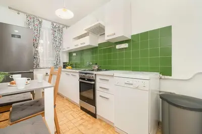 Kuchnia lub aneks kuchenny w obiekcie Merliniego Trendy Apartment with Desk by Noclegi Renters