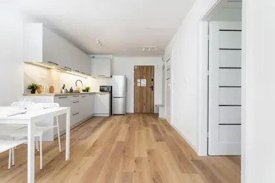 Kuchnia lub aneks kuchenny w obiekcie SuperApart Jana Pawła II apt 312 - Blisko Hala Mirowska