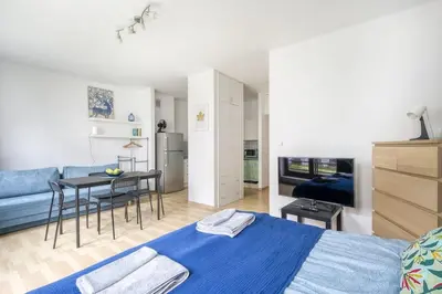 Łóżko lub łóżka w pokoju w obiekcie Apartament Stadion