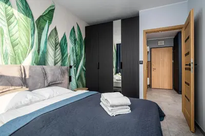 Łóżko lub łóżka w pokoju w obiekcie Wiktoryn 6 by Perfect Apart