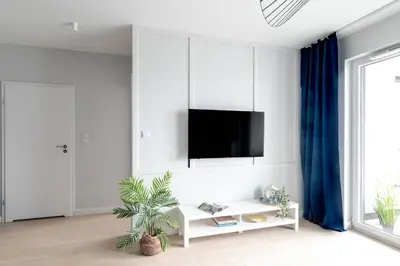Telewizja i/lub zestaw kina domowego w obiekcie Habicha Apartment Ursus AC Parking by Mia
