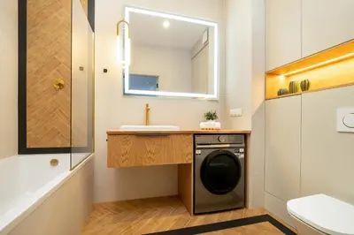 Łazienka w obiekcie Air Conditioned Apartment in Warsaw with Parking and Bathtub by Noclegi Renters