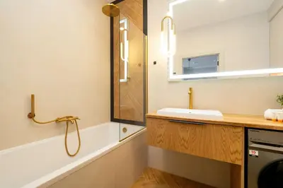 Łazienka w obiekcie Air Conditioned Apartment in Warsaw with Parking and Bathtub by Noclegi Renters