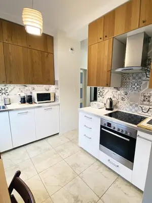 Kuchnia lub aneks kuchenny w obiekcie Comfortable Penthouse Burakowska