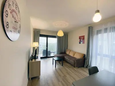 Telewizja i/lub zestaw kina domowego w obiekcie Comfortable Penthouse Burakowska