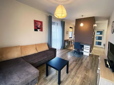 Telewizja i/lub zestaw kina domowego w obiekcie Comfortable Penthouse Burakowska