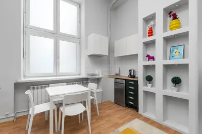 Kuchnia lub aneks kuchenny w obiekcie Chmielna 73C A-C by Homeprime