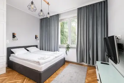Łóżko lub łóżka w pokoju w obiekcie RentPlanet - Studio przy Parku Szczęśliwickim