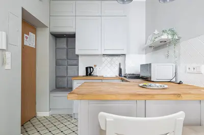 Kuchnia lub aneks kuchenny w obiekcie RentPlanet - Studio przy Parku Szczęśliwickim