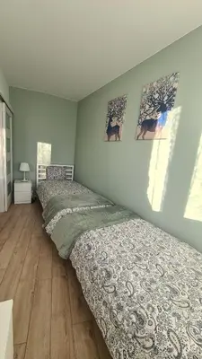 Łóżko lub łóżka w pokoju w obiekcie Apartament Dębowe Zacisze Tużycka