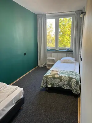 Łóżko lub łóżka w pokoju w obiekcie Samba Life Apartment